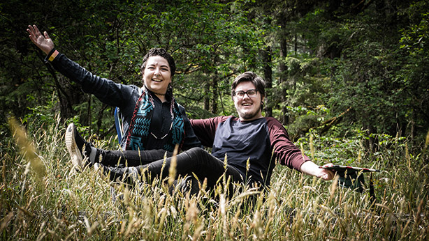 Photo of a couple together in a field.